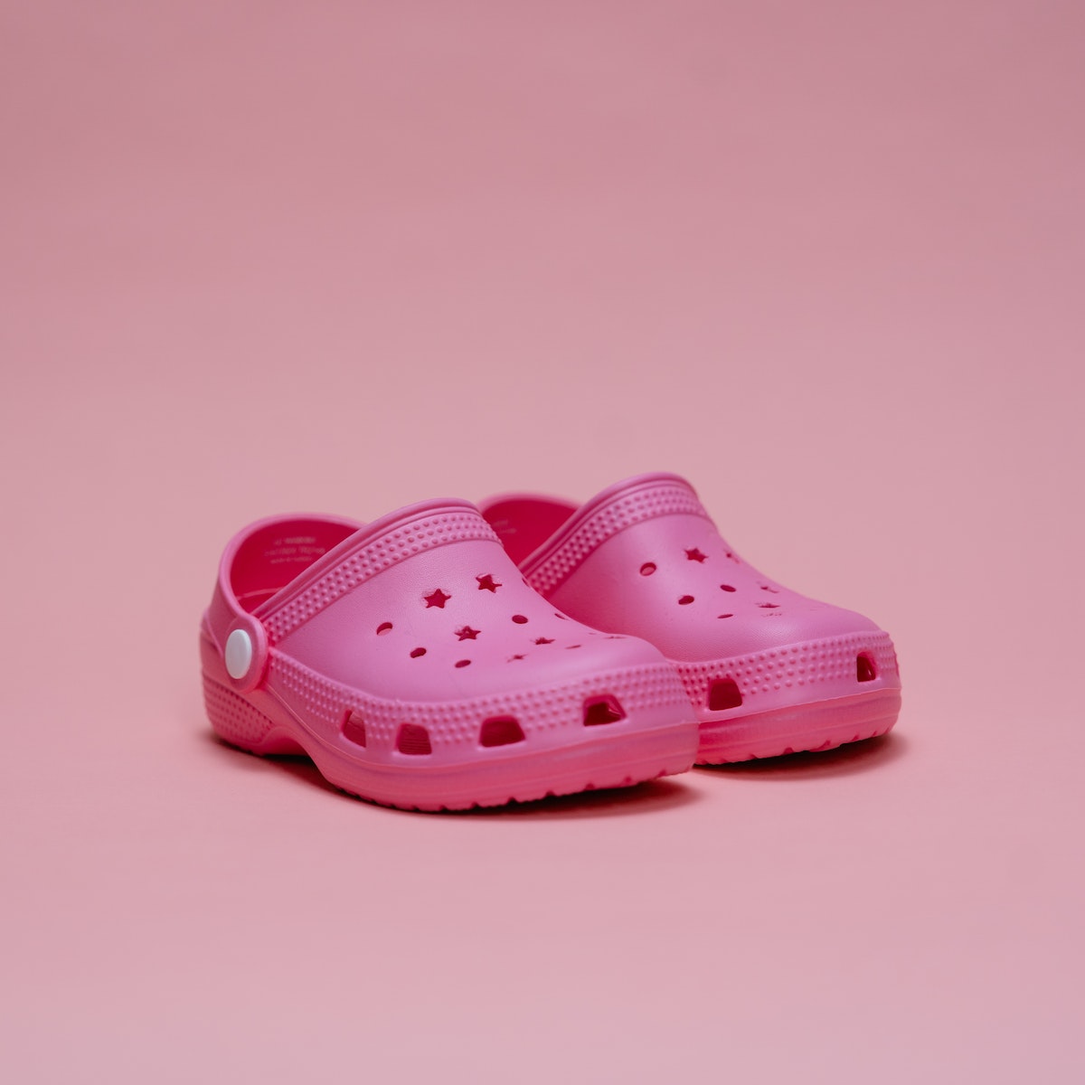 Close-up Photo of Pink Rubber Clogs