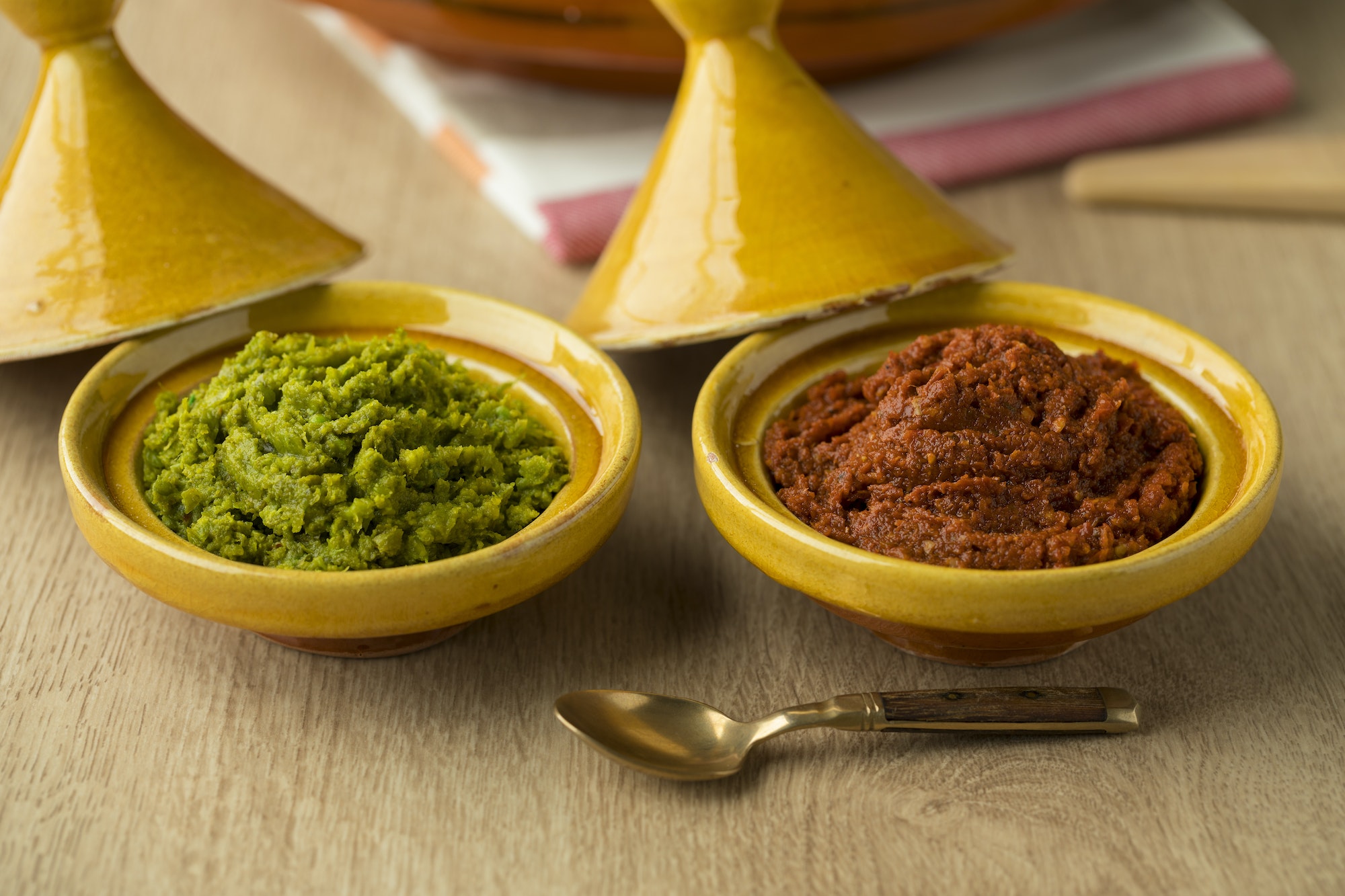 Red and green harissa close up