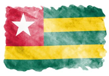 Togo flag is depicted in liquid watercolor style isolated on white background