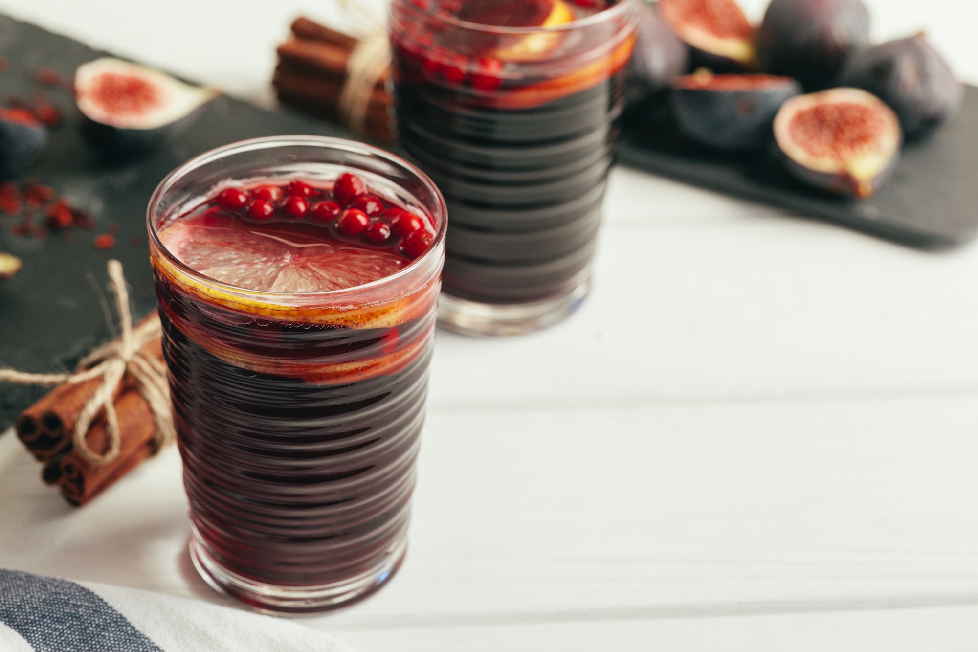 New Year composition with mulled wine on dark wooden background